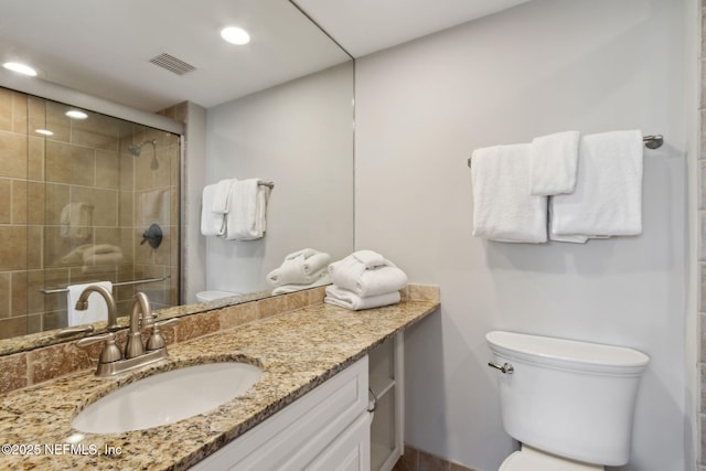 1165 Beach Walker Rd, Fernandina Beach, FL 32034 - full bath featuring toilet, vanity, a stall shower, recessed lighting, and baseboards