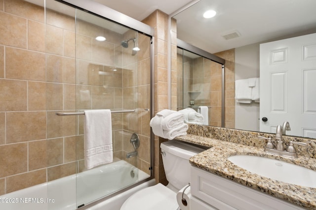 1165 Beach Walker Rd, Fernandina Beach, FL 32034 - full bath featuring toilet, vanity, enclosed tub / shower combo, and recessed lighting