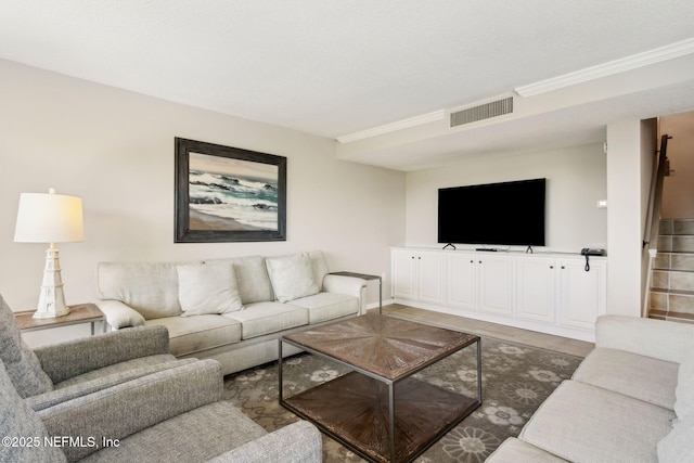 1165 Beach Walker Rd, Fernandina Beach, FL 32034 - living area with stairs, ornamental molding, and tile patterned floors