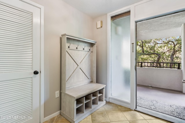 1165 Beach Walker Rd, Fernandina Beach, FL 32034 - mudroom with light tile patterned floors