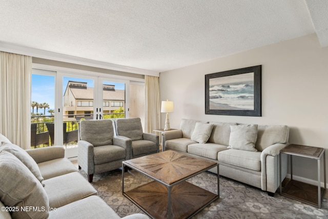 1165 Beach Walker Rd, Fernandina Beach, FL 32034 - living room featuring french doors and a textured ceiling