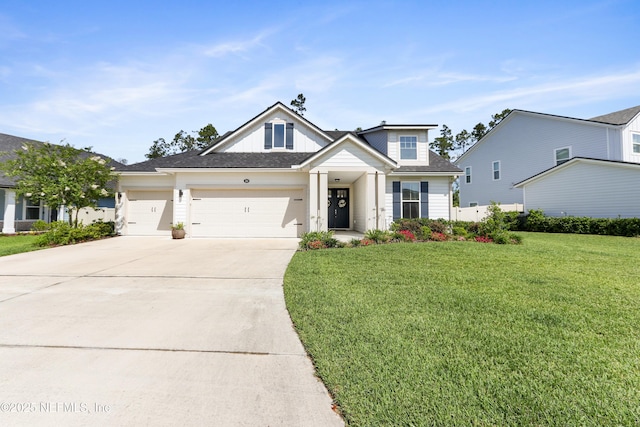 264 Windermere Way, Saint Augustine, FL 32095 - modern inspired farmhouse featuring concrete driveway, a front lawn, and an attached garage