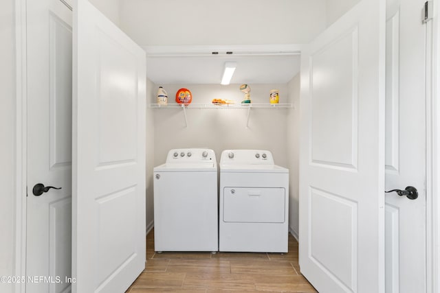 264 Windermere Way, Saint Augustine, FL 32095 - laundry room with washer and dryer and light wood-style floors