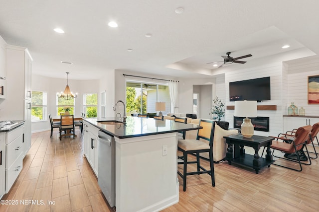264 Windermere Way, Saint Augustine, FL 32095 - kitchen with a sink, recessed lighting, light wood-style flooring, white cabinetry, and stainless steel appliances