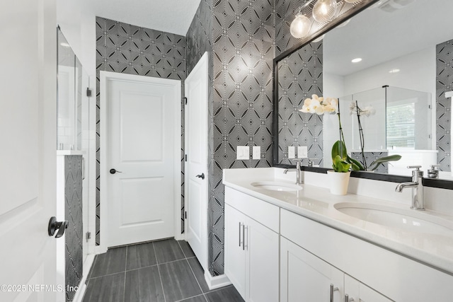 264 Windermere Way, Saint Augustine, FL 32095 - bathroom featuring double vanity, a stall shower, and wallpapered walls