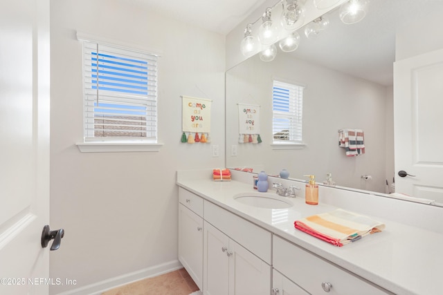 264 Windermere Way, Saint Augustine, FL 32095 - bathroom with vanity, baseboards, and tile patterned floors