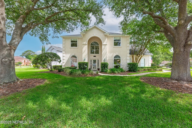 6547 Burnham Cir, Ponte Vedra Beach, FL 32082 - view of front of home featuring a front lawn and stucco siding