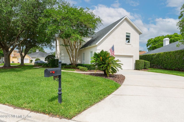 6547 Burnham Cir, Ponte Vedra Beach, FL 32082 - traditional-style home featuring concrete driveway, stucco siding, a front lawn, and a garage