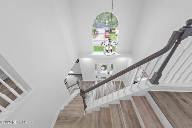 6547 Burnham Cir, Ponte Vedra Beach, FL 32082 - stairs with a towering ceiling and a chandelier