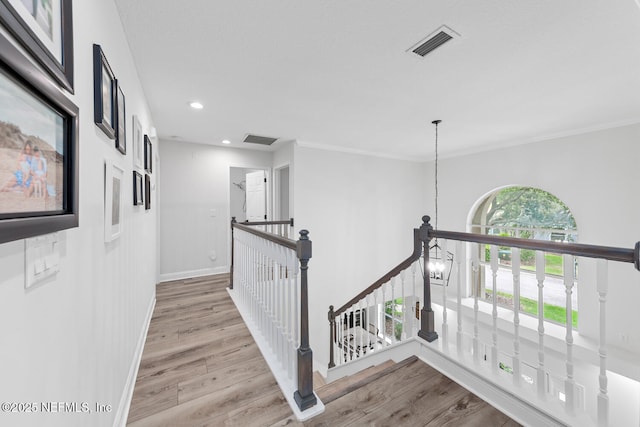 6547 Burnham Cir, Ponte Vedra Beach, FL 32082 - hall featuring an upstairs landing, wood finished floors, baseboards, recessed lighting, and ornamental molding