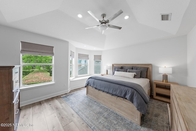 6547 Burnham Cir, Ponte Vedra Beach, FL 32082 - bedroom with light wood-type flooring, recessed lighting, a raised ceiling, ceiling fan, and baseboards