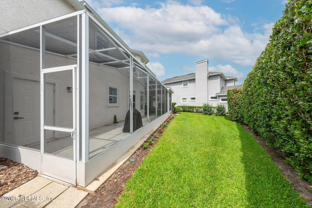 6547 Burnham Cir, Ponte Vedra Beach, FL 32082 - view of green lawn featuring glass enclosure