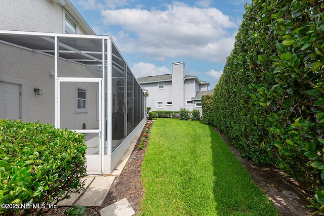 6547 Burnham Cir, Ponte Vedra Beach, FL 32082 - view of green lawn with glass enclosure