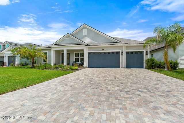 638 Windley Dr, Saint Augustine, FL 32092 - single story home with driveway, an attached garage, and a front lawn