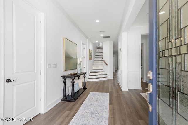638 Windley Dr, Saint Augustine, FL 32092 - entryway with wood finished floors, baseboards, recessed lighting, stairs, and ornamental molding