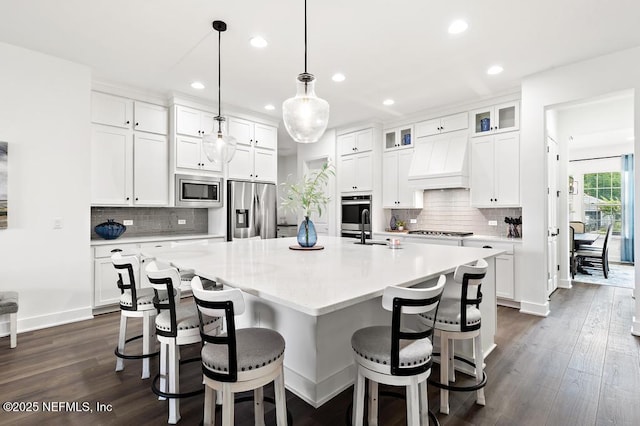 638 Windley Dr, Saint Augustine, FL 32092 - kitchen with appliances with stainless steel finishes, recessed lighting, light countertops, decorative backsplash, and white cabinets