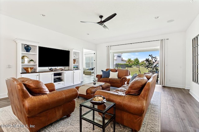 638 Windley Dr, Saint Augustine, FL 32092 - living room with a ceiling fan, light wood-type flooring, and baseboards
