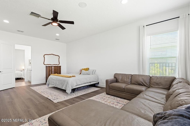 638 Windley Dr, Saint Augustine, FL 32092 - bedroom with recessed lighting, baseboards, wood finished floors, ceiling fan, and ensuite bath