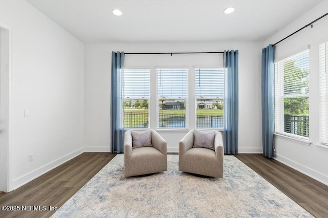 638 Windley Dr, Saint Augustine, FL 32092 - sitting room with dark wood-style floors, baseboards, recessed lighting, and a water view