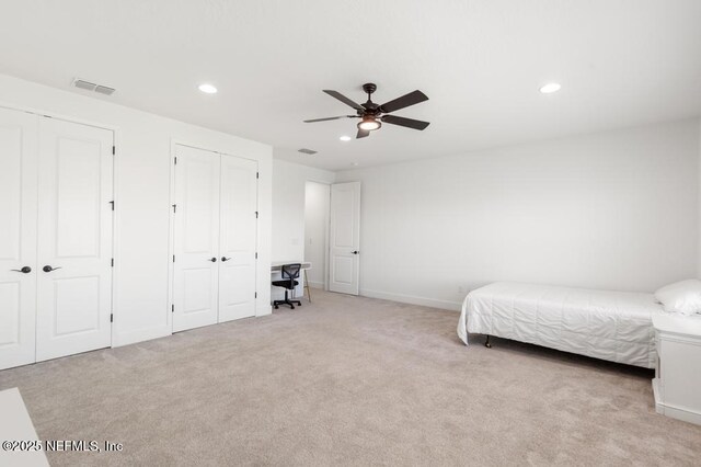 638 Windley Dr, Saint Augustine, FL 32092 - carpeted bedroom with multiple closets, recessed lighting, baseboards, a ceiling fan, and a desk