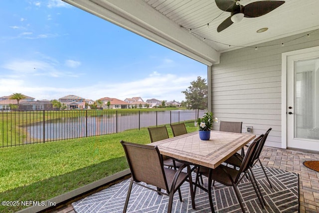 638 Windley Dr, Saint Augustine, FL 32092 - view of patio / terrace with ceiling fan, a water view, outdoor dining area, and a residential view