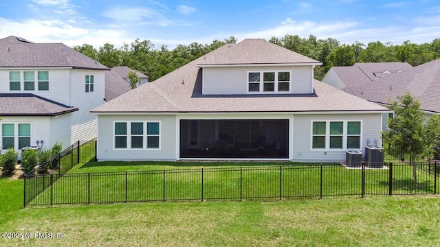 638 Windley Dr, Saint Augustine, FL 32092 - rear view of house featuring central air condition unit, a sunroom, and a shingled roof
