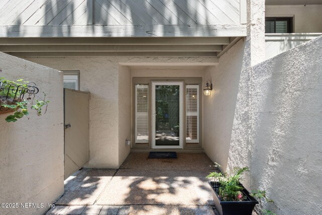 3036 Sea Marsh Rd, Fernandina Beach, FL 32034 - property entrance with stucco siding