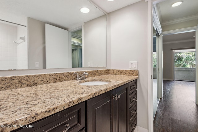 3036 Sea Marsh Rd, Fernandina Beach, FL 32034 - full bathroom featuring ornamental molding, vanity, wood finished floors, baseboards, and recessed lighting