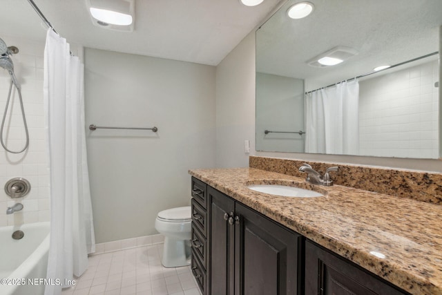 3036 Sea Marsh Rd, Fernandina Beach, FL 32034 - full bathroom with vanity, tile patterned flooring, toilet, baseboards, and shower / bath combo