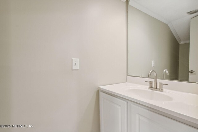 3036 Sea Marsh Rd, Fernandina Beach, FL 32034 - bathroom with crown molding and vanity