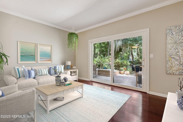 3036 Sea Marsh Rd, Fernandina Beach, FL 32034 - living area with crown molding, baseboards, and wood finished floors
