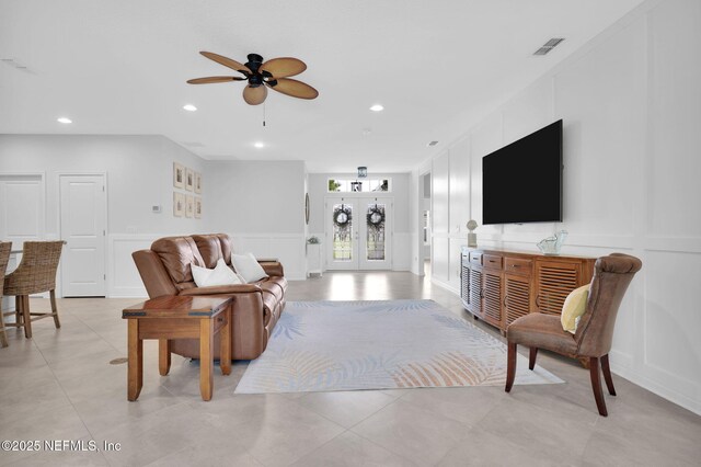 25 Carnauba Way, Jacksonville, FL 32081 - living area with a decorative wall, ceiling fan, french doors, recessed lighting, and wainscoting