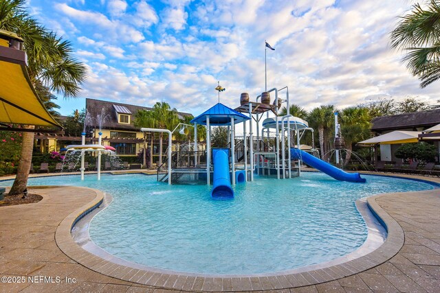 25 Carnauba Way, Jacksonville, FL 32081 - view of swimming pool featuring a water play area and a water slide