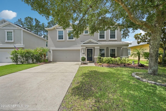 145 Thornloe Dr, Saint Johns, FL 32259 - traditional-style house featuring stucco siding, a garage, concrete driveway, and a front lawn