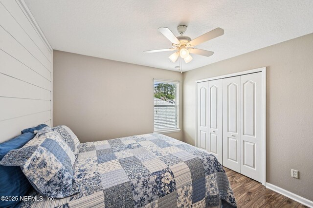 145 Thornloe Dr, Saint Johns, FL 32259 - bedroom with wood finished floors, a closet, ceiling fan, and baseboards
