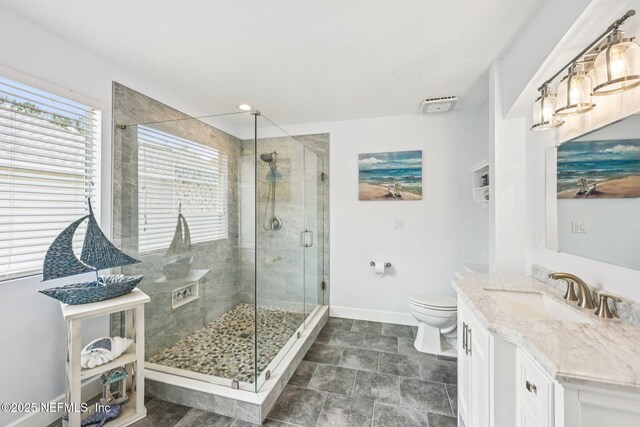 145 Thornloe Dr, Saint Johns, FL 32259 - full bathroom featuring vanity, baseboards, a shower stall, and toilet