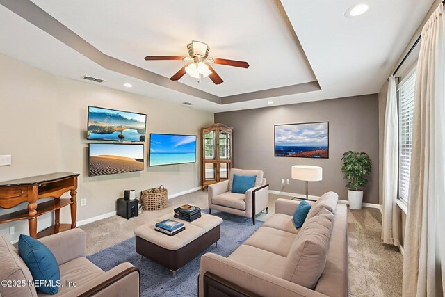 145 Thornloe Dr, Saint Johns, FL 32259 - carpeted living room with ceiling fan, baseboards, recessed lighting, and a raised ceiling
