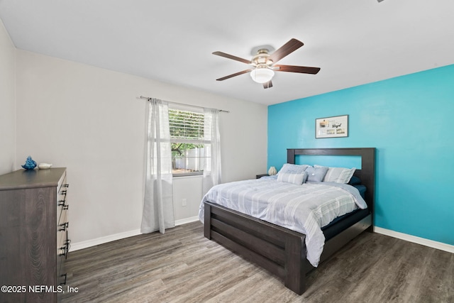147 Quarton Dr, Orange Park, FL 32073 - bedroom featuring wood finished floors, baseboards, and a ceiling fan