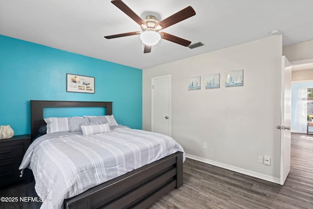 147 Quarton Dr, Orange Park, FL 32073 - bedroom with wood finished floors, baseboards, and a ceiling fan