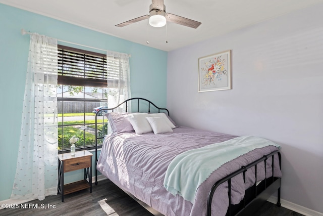 147 Quarton Dr, Orange Park, FL 32073 - bedroom with wood finished floors, baseboards, and a ceiling fan
