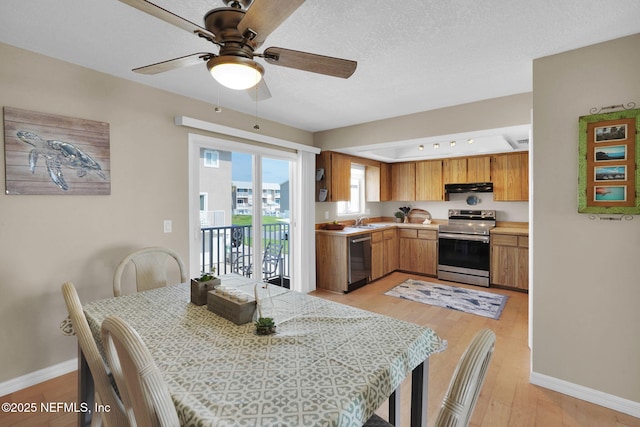 2898 Ocean Shore Blvd Unit 4020, Ormond Beach, FL 32176 - dining space with baseboards, light wood-type flooring, and a ceiling fan