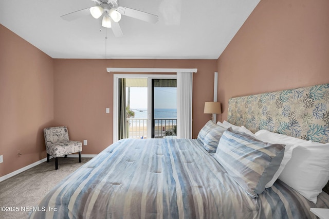 2898 Ocean Shore Blvd Unit 4020, Ormond Beach, FL 32176 - bedroom with access to exterior, carpet flooring, baseboards, and a ceiling fan