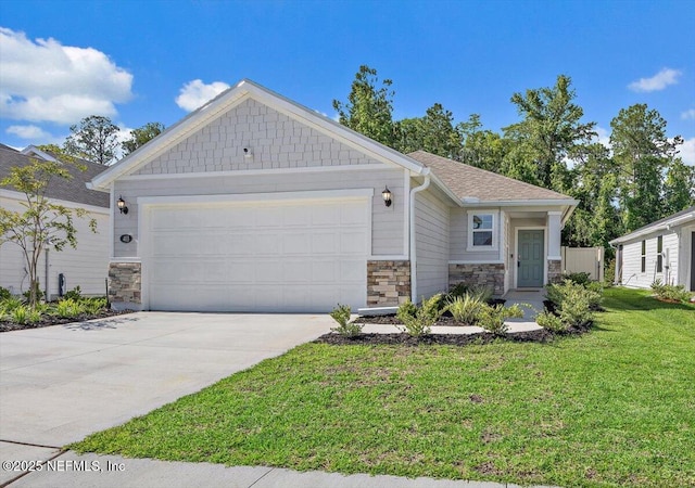 403 Boulder Ln, Jacksonville, FL 32259 - view of front of house featuring stone siding, an attached garage, a front yard, and concrete driveway