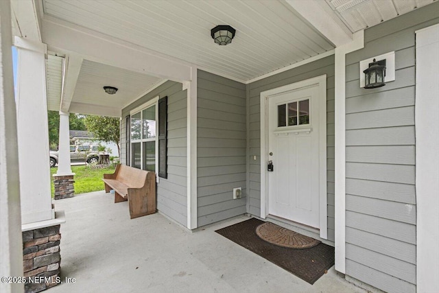 4116 Adirolf Rd, Jacksonville, FL 32207 - property entrance with a porch