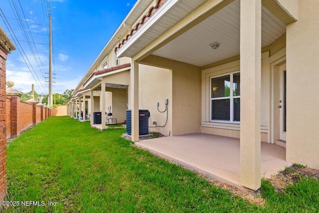 1684 Sanctuary Way, Fleming Island, FL 32003 - view of yard featuring a patio area and central AC unit