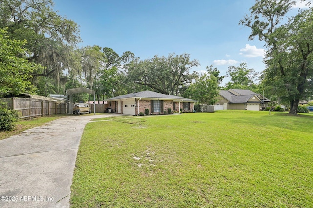 884 Live Oak Ln, Fleming Island, FL 32003 - view of front of home with a carport, brick siding, and driveway
