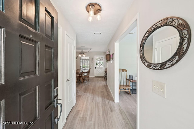 884 Live Oak Ln, Fleming Island, FL 32003 - entrance foyer with light wood-type flooring and baseboards