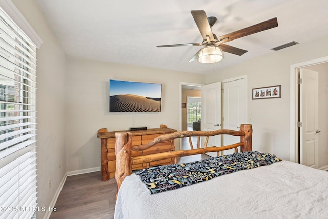 884 Live Oak Ln, Fleming Island, FL 32003 - bedroom featuring wood finished floors and a ceiling fan
