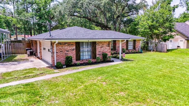 884 Live Oak Ln, Fleming Island, FL 32003 - single story home featuring concrete driveway, brick siding, roof with shingles, and a garage