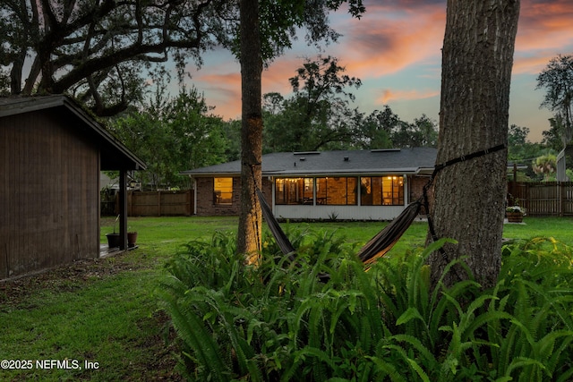 884 Live Oak Ln, Fleming Island, FL 32003 - back of house featuring brick siding